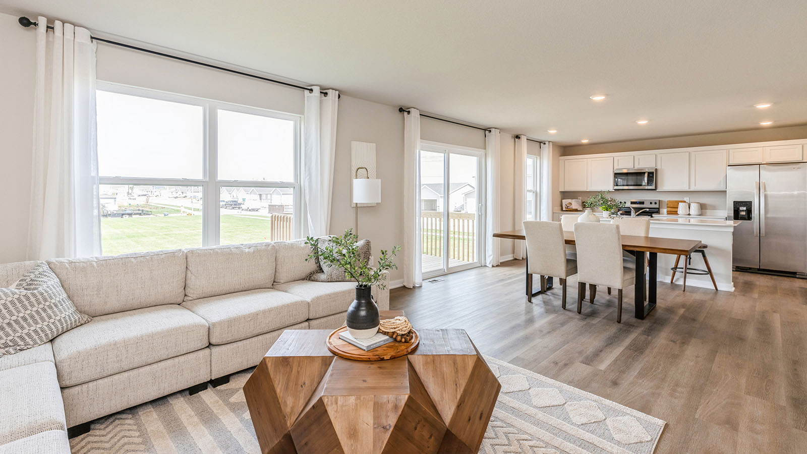 Open concept floor plan with view of living room and kitchen
