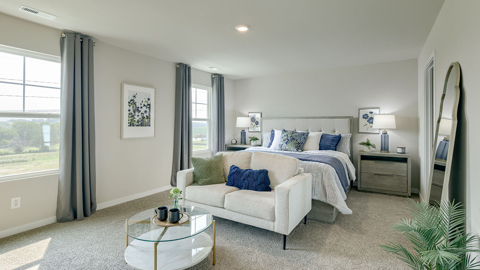 Large Primary bedroom in the Bellhaven showing a sitting area