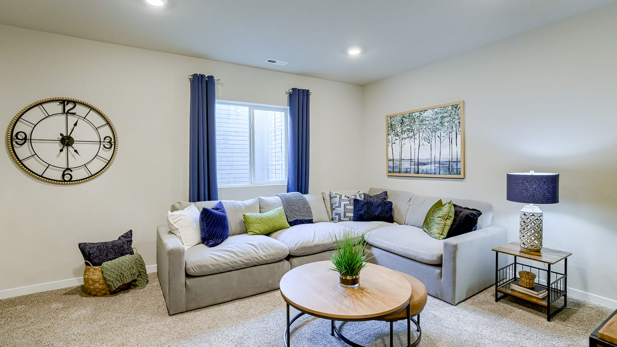 Bellhaven finished basement living room with a sectional couch