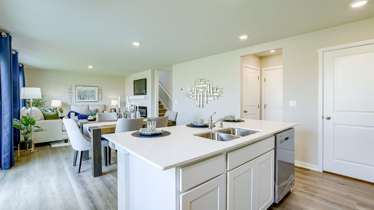 Bellhaven kitchen island overlooking dining area and living room