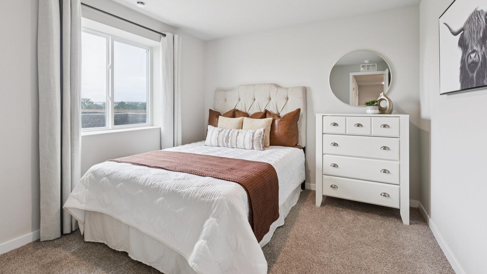 basement bedrrom of fremont with double bed and large window