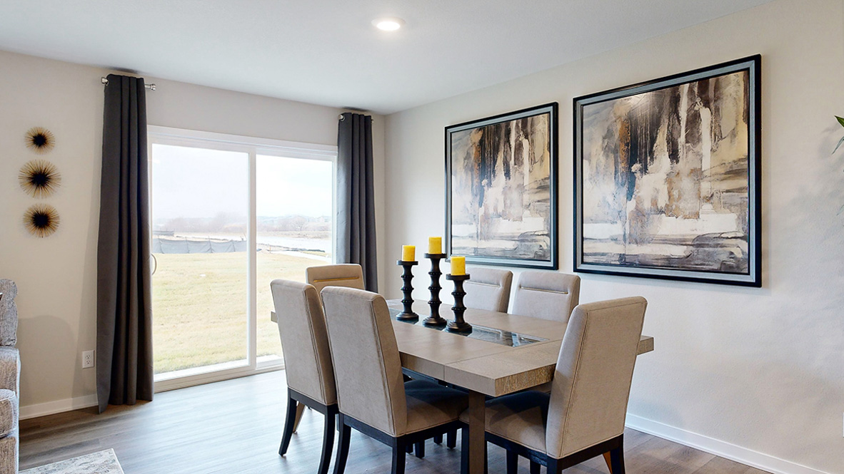 Dining room of the Roland with sliding glass doors