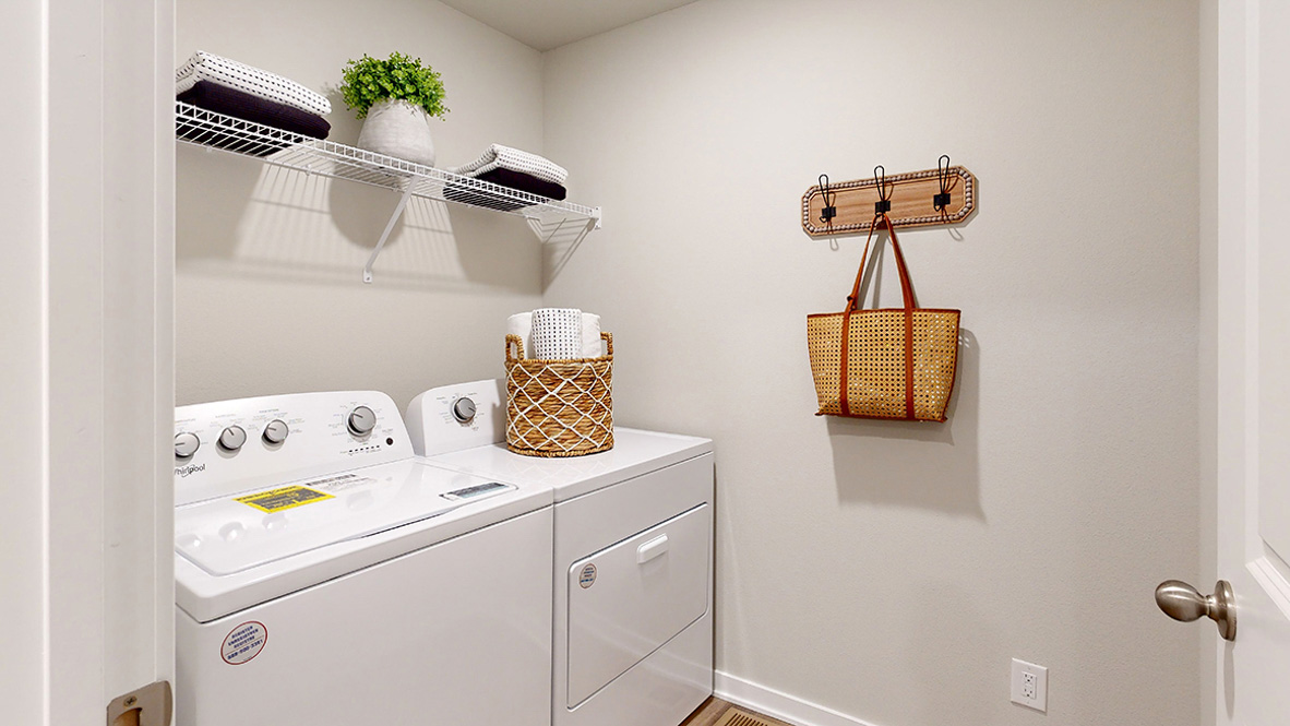 Hamilton laundry room with shelf and wall hooks