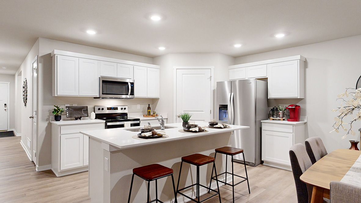 Hamilton kitchen with center island and stainless steel appliances