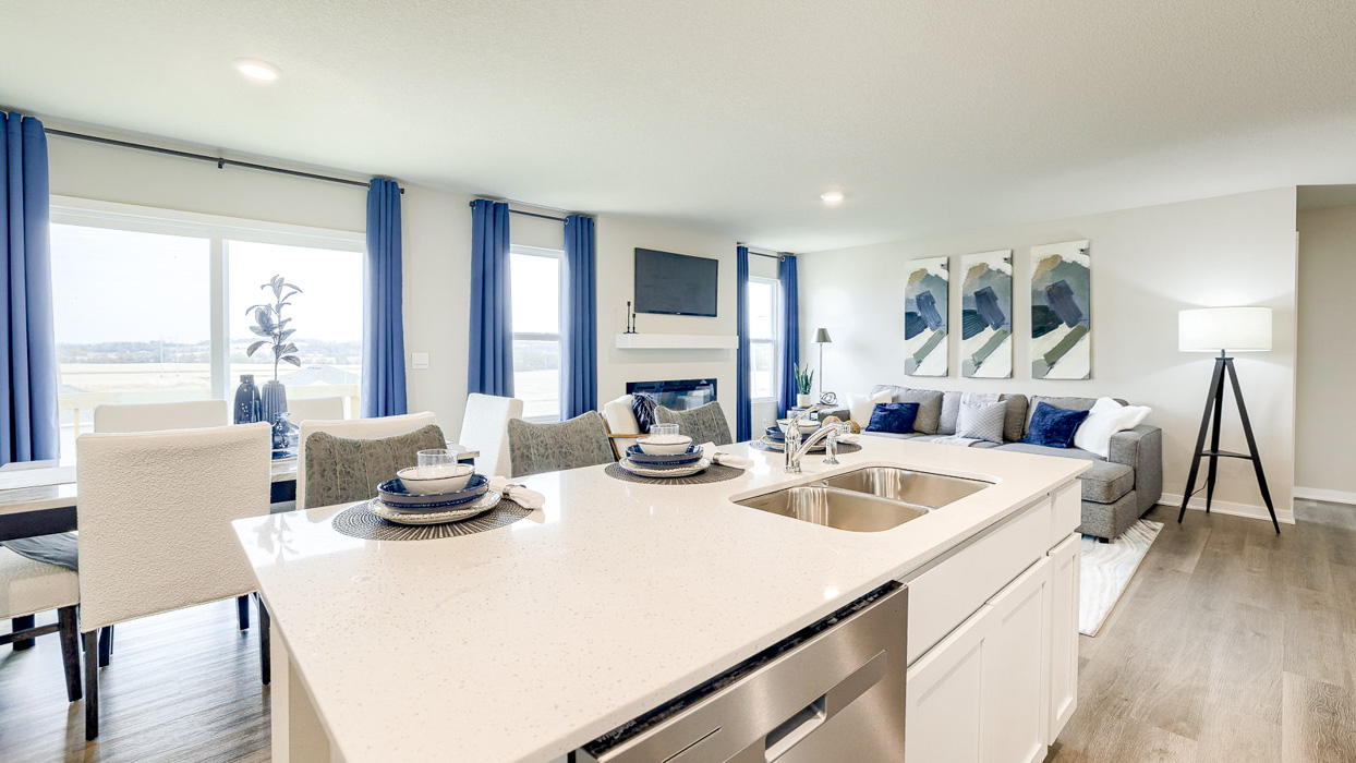 Overview of the Hamilton living room and dining area from the kitchen island