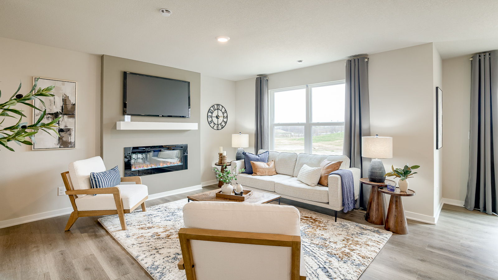 Full view of the Sydney living room with couch and chairs