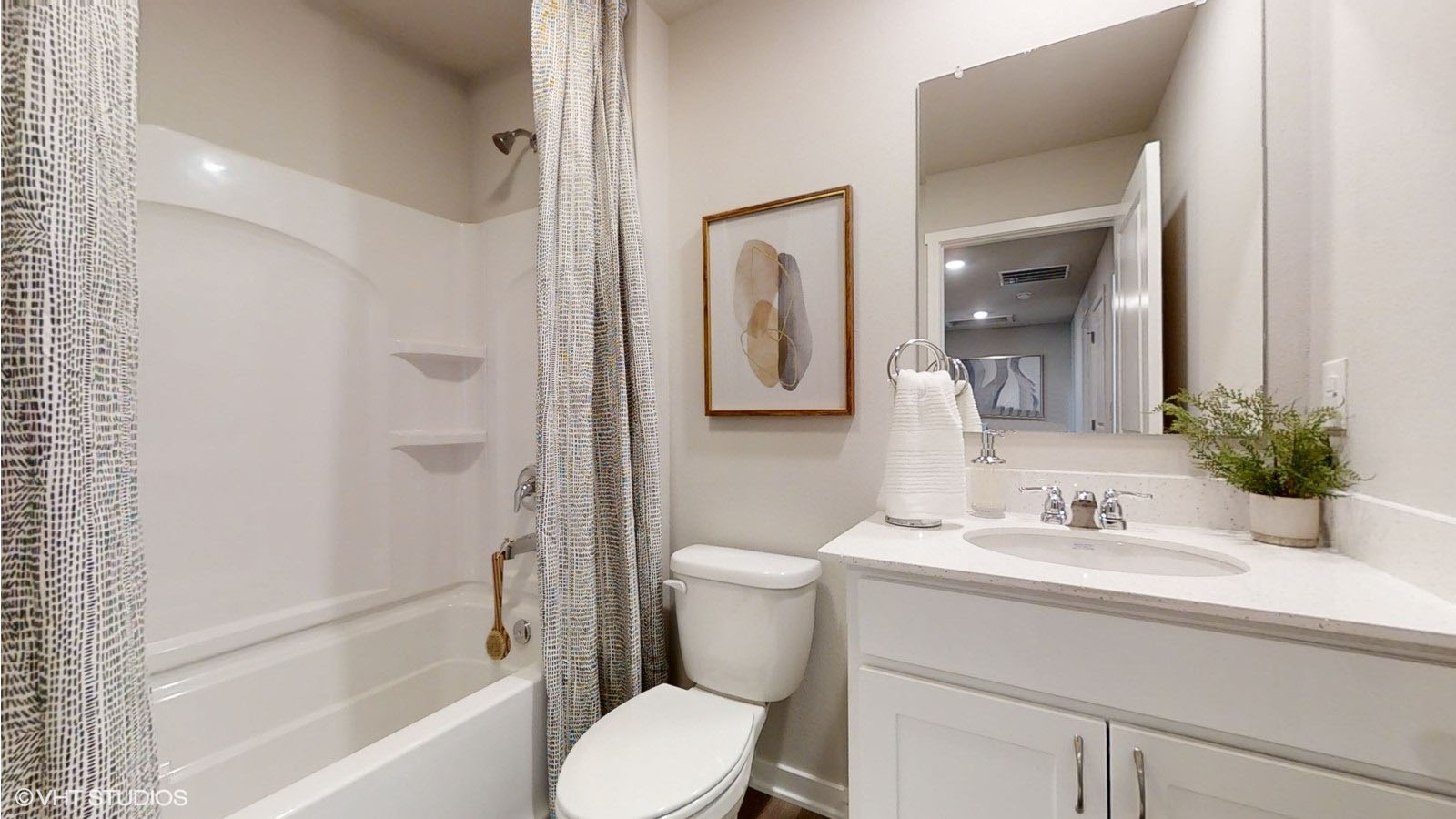 Second full bathroom in the Sydney with bathtub sink and toilet