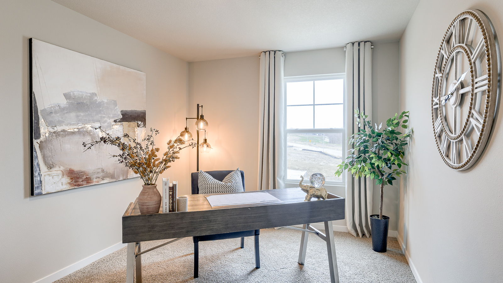 Third bedroom of the Sydney staged to be an office with larger window