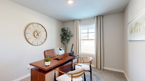 Third bedroom staged as a home office