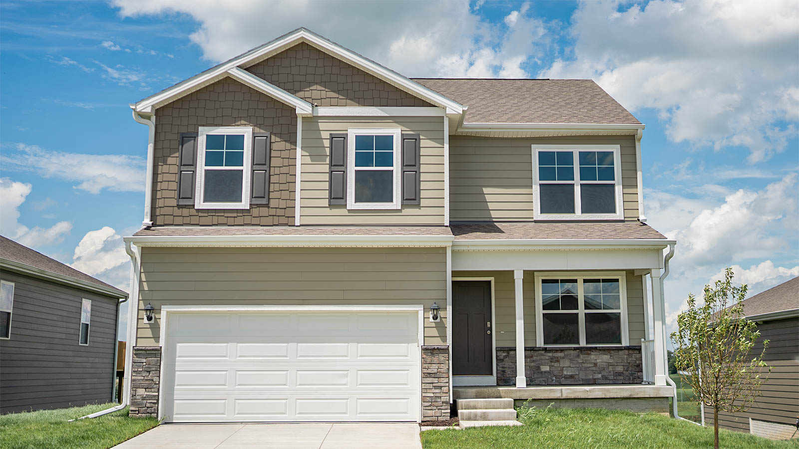 Exterior of Bellhaven, 2 story home, with 2 car garage and covered front porch