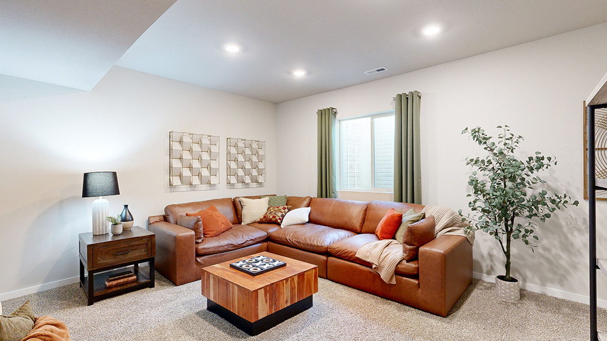 Bellhaven finished basement living room with a sectional couch