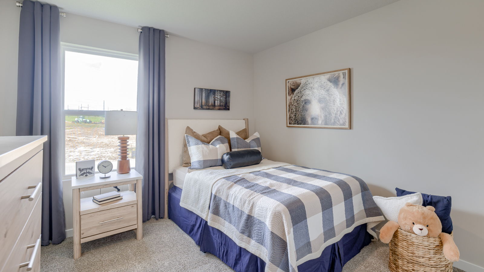 Secondary Bedroom of Neuville staged as a kids room