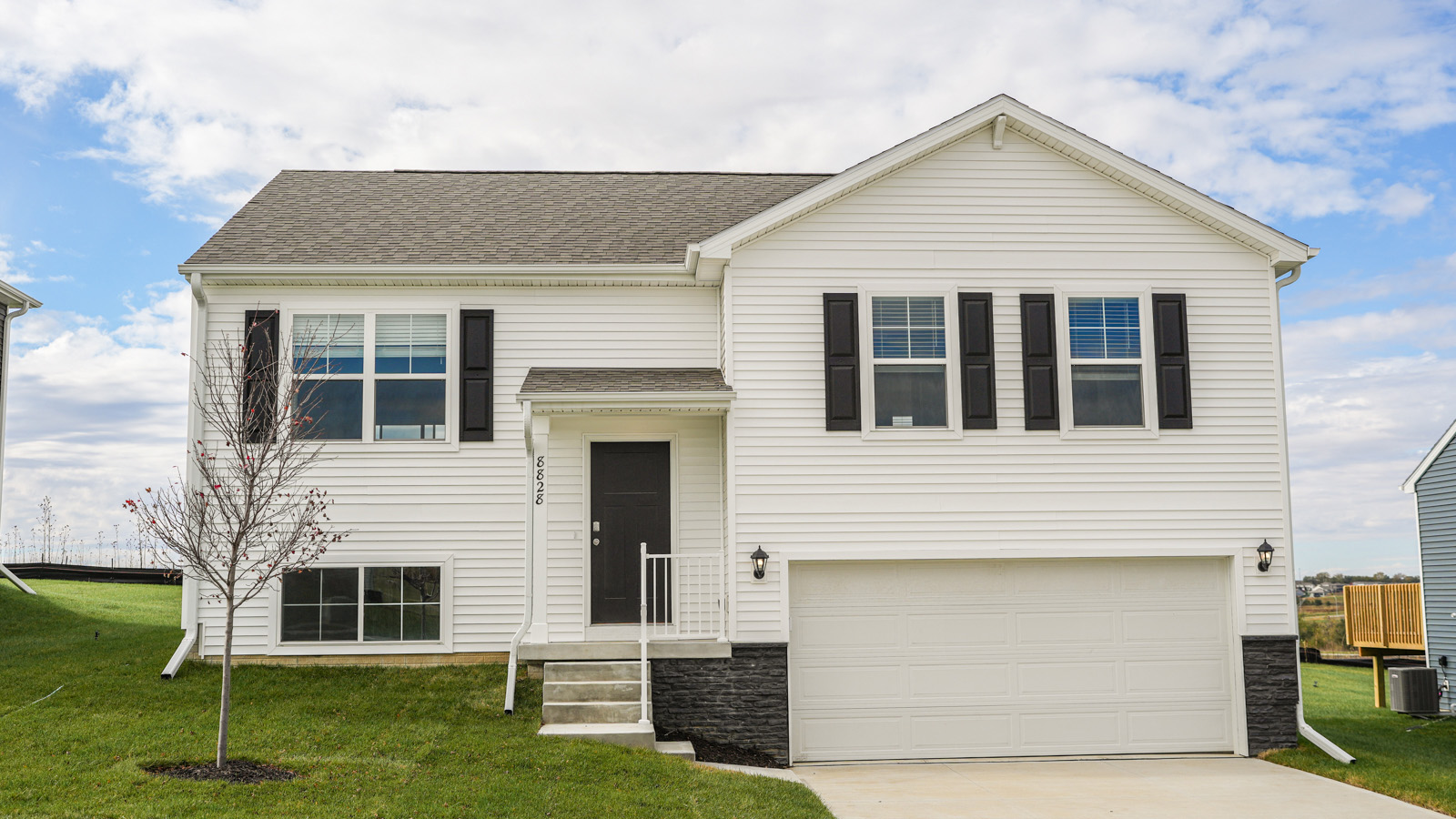 Fremont Plan, Westbrook Hills By D.R. Horton, 4 bed, 3 bath, 2-car garage, 1.5 story street neighborhood view