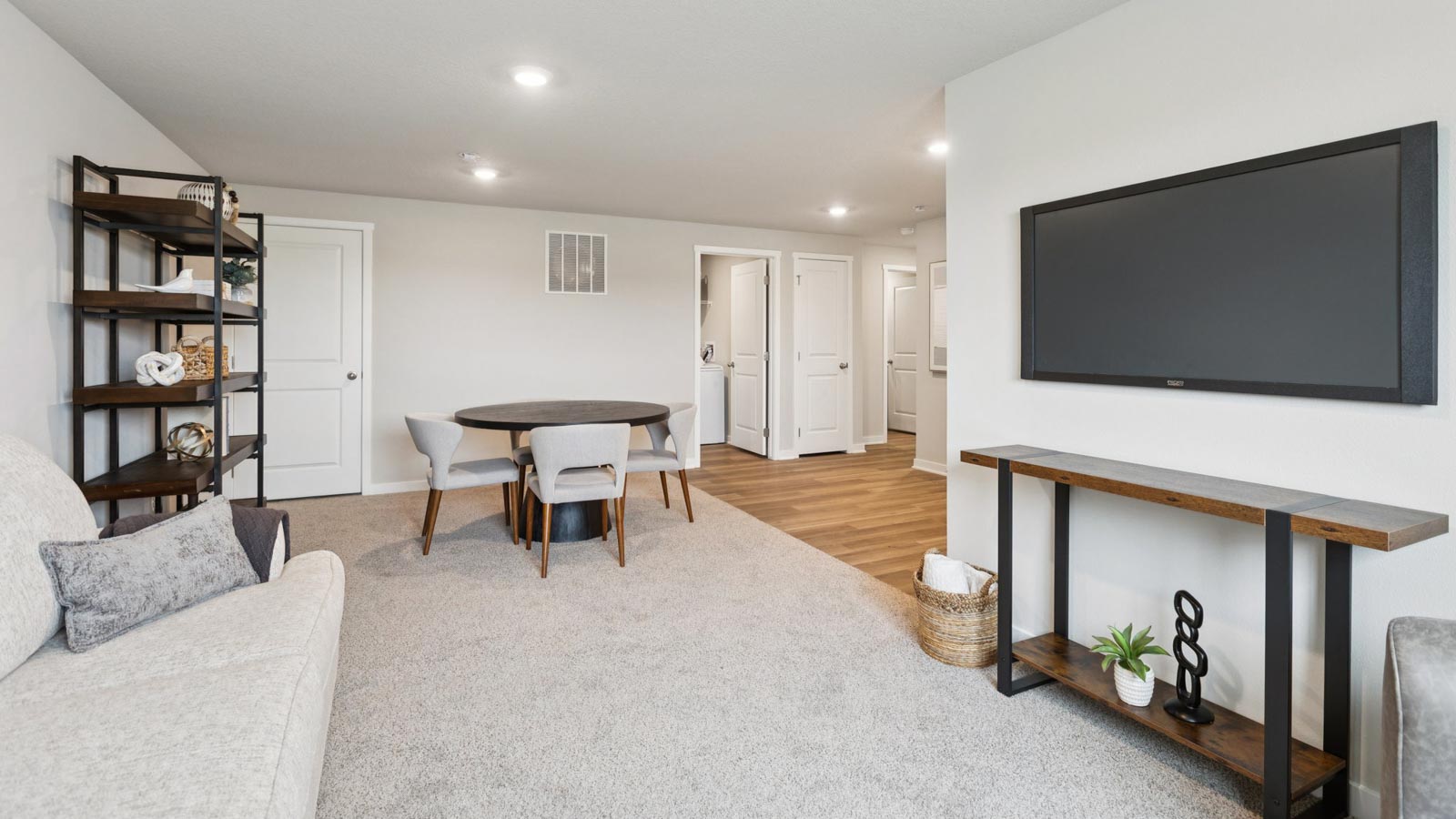 New home living room with modern design details and functional connectivity near stairs for daily flexibility