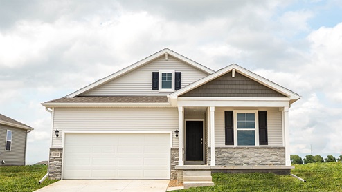 Exterior photo of the Abbott with grey siding, stone and a covered front porch