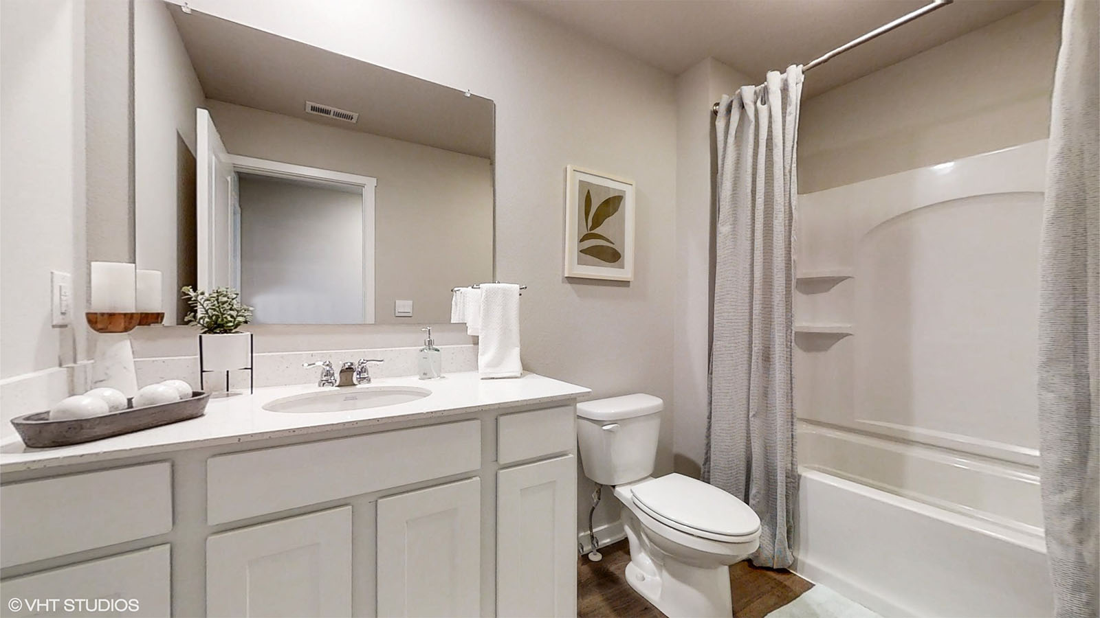 Second bathoroom with sink toilet and tub in the Bellhaven