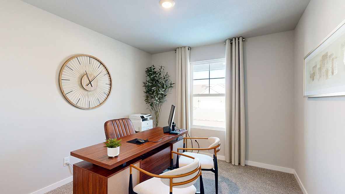 Third bedroom staged as a home office in the Abbott