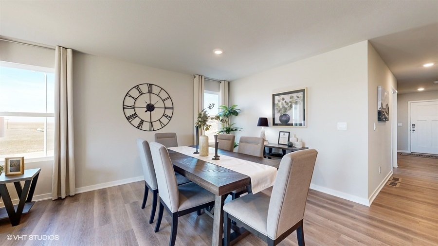 Abbott dining room area with dining table and 6 chairs
