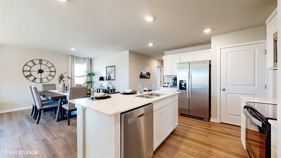 Abbott kitchen area showcasing appliances and looking to dining area