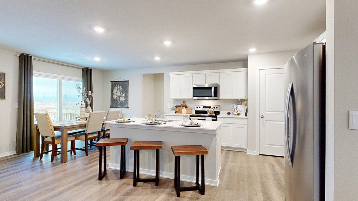 Reagan kitchen and dining room showing the open concept layout