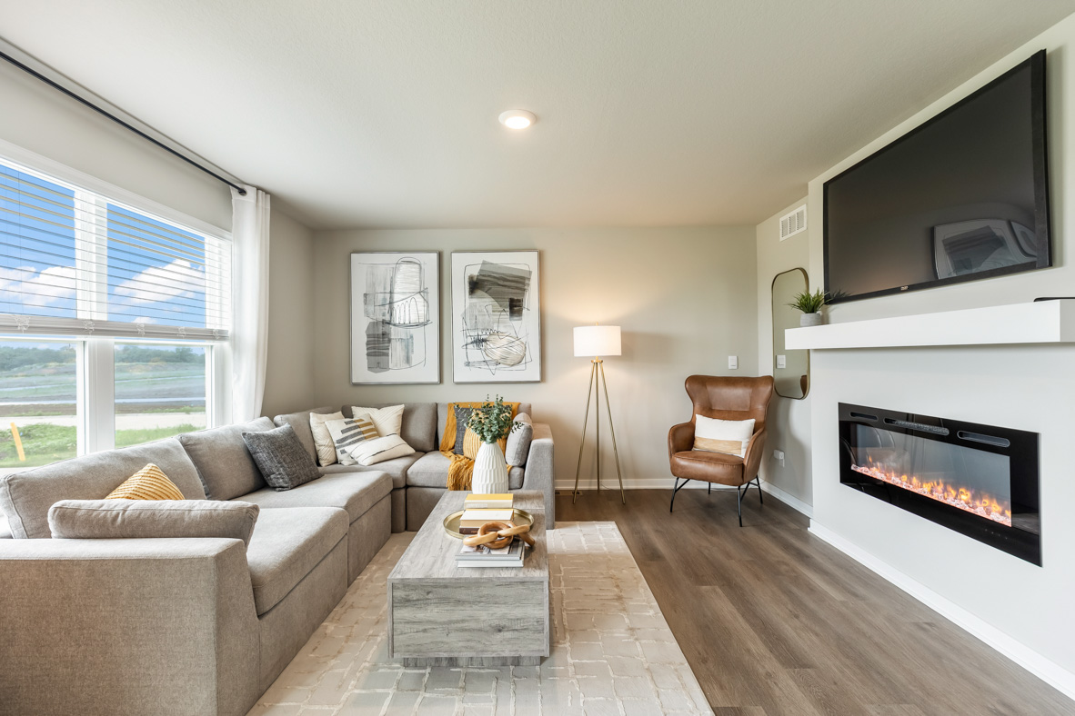 bright Living room with electric fireplace