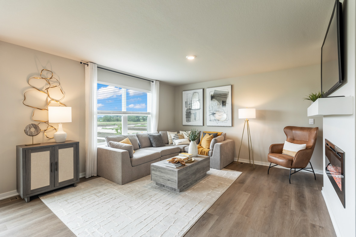 Living room with large window that floods the room with natural light