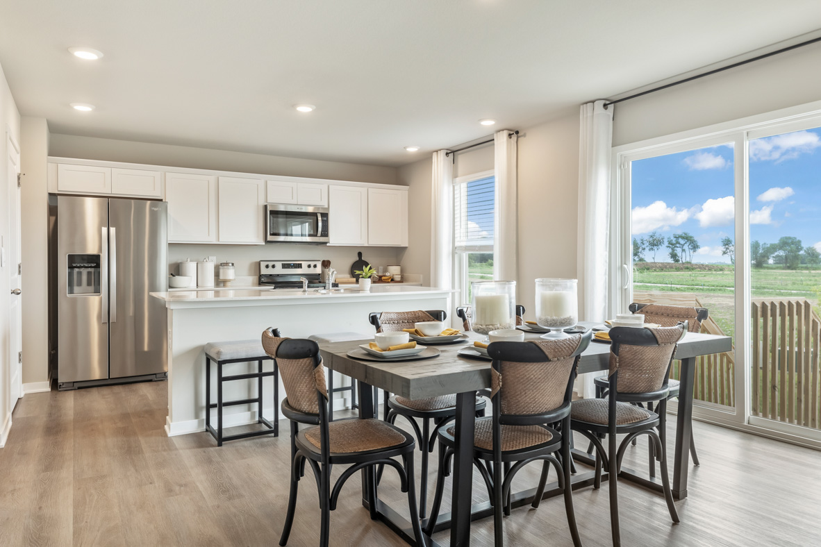 Dining room next to sliding glass doors