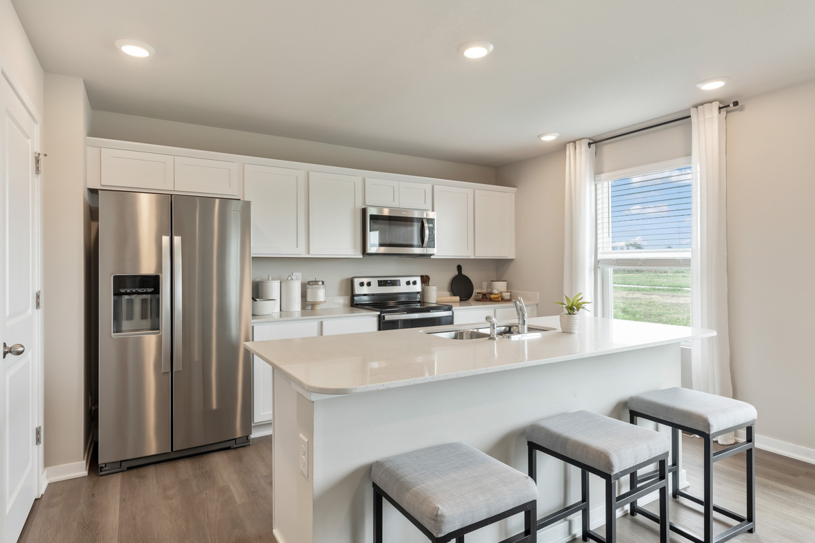Kitchen with island and small window
