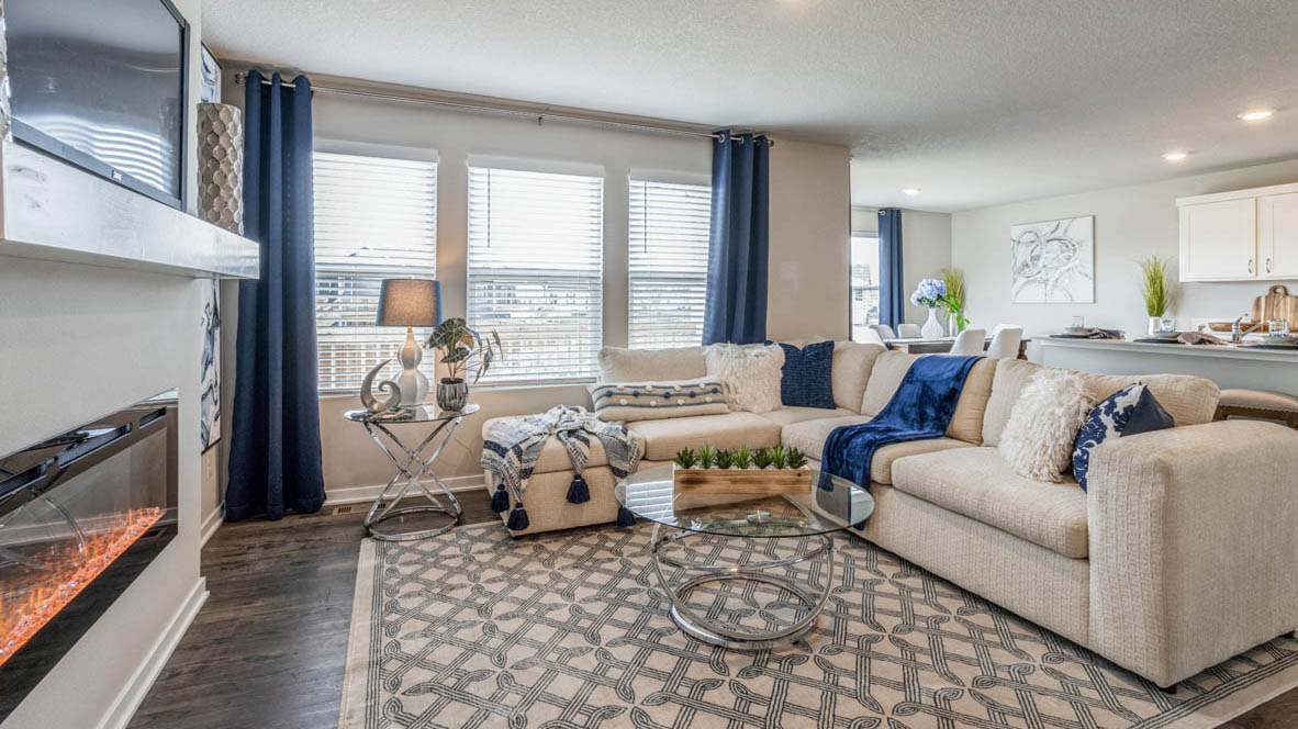 View from kitchen to the living, dining and backyard areas, delivering our fresh open design, Majestic Pointe