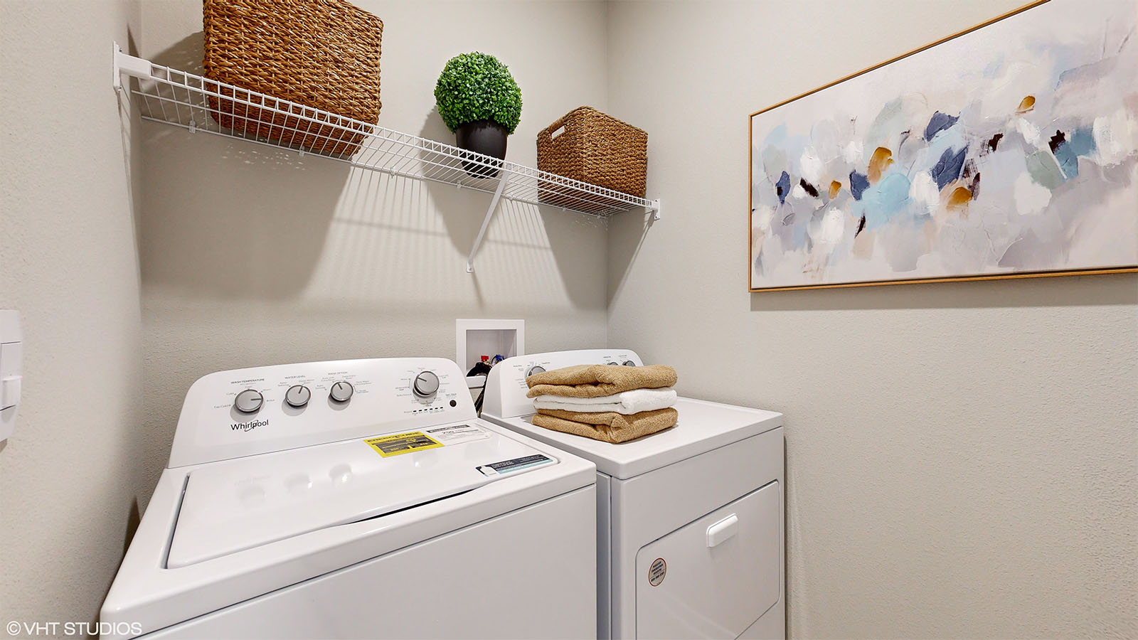 Laundry room with shelves in the Fairfield