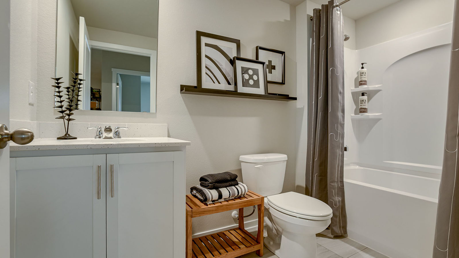 Basement Bathroom with brown towel rack