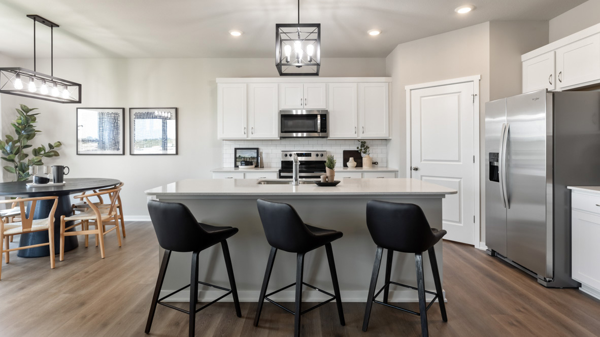 Kitchen with island and barstools