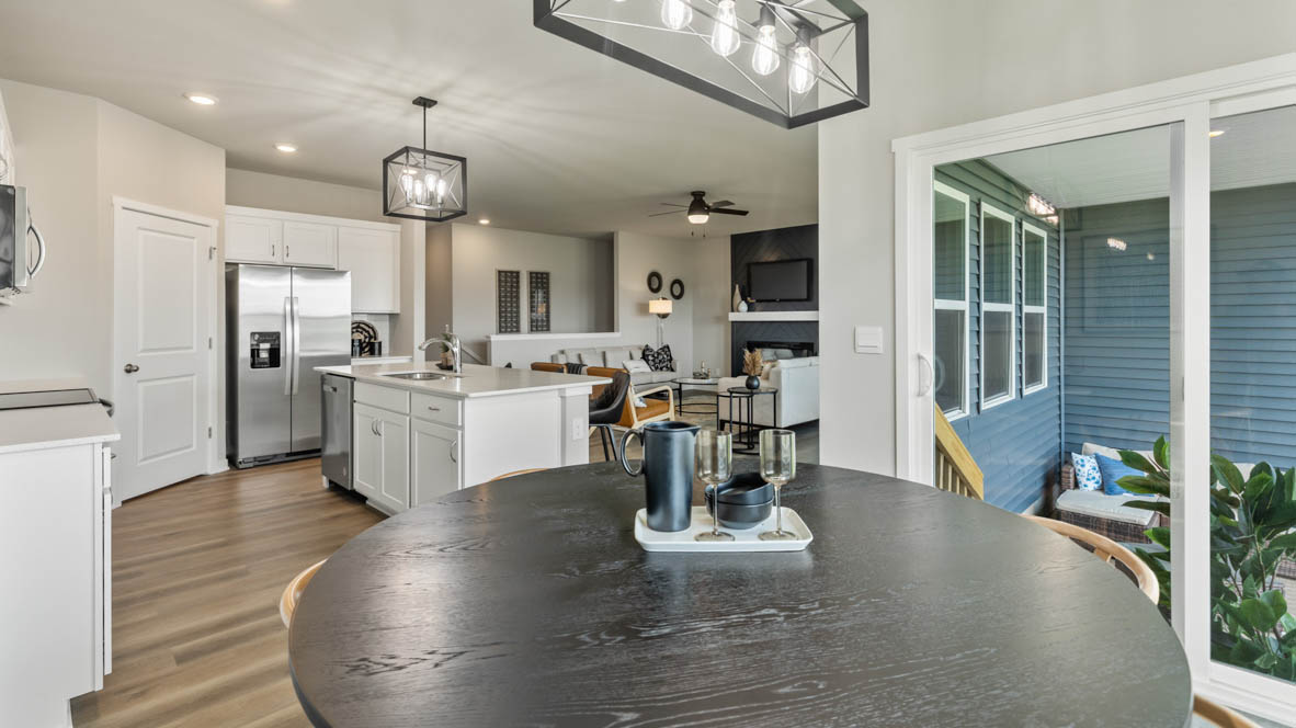 Dining room table overlooking the kitchen and living room