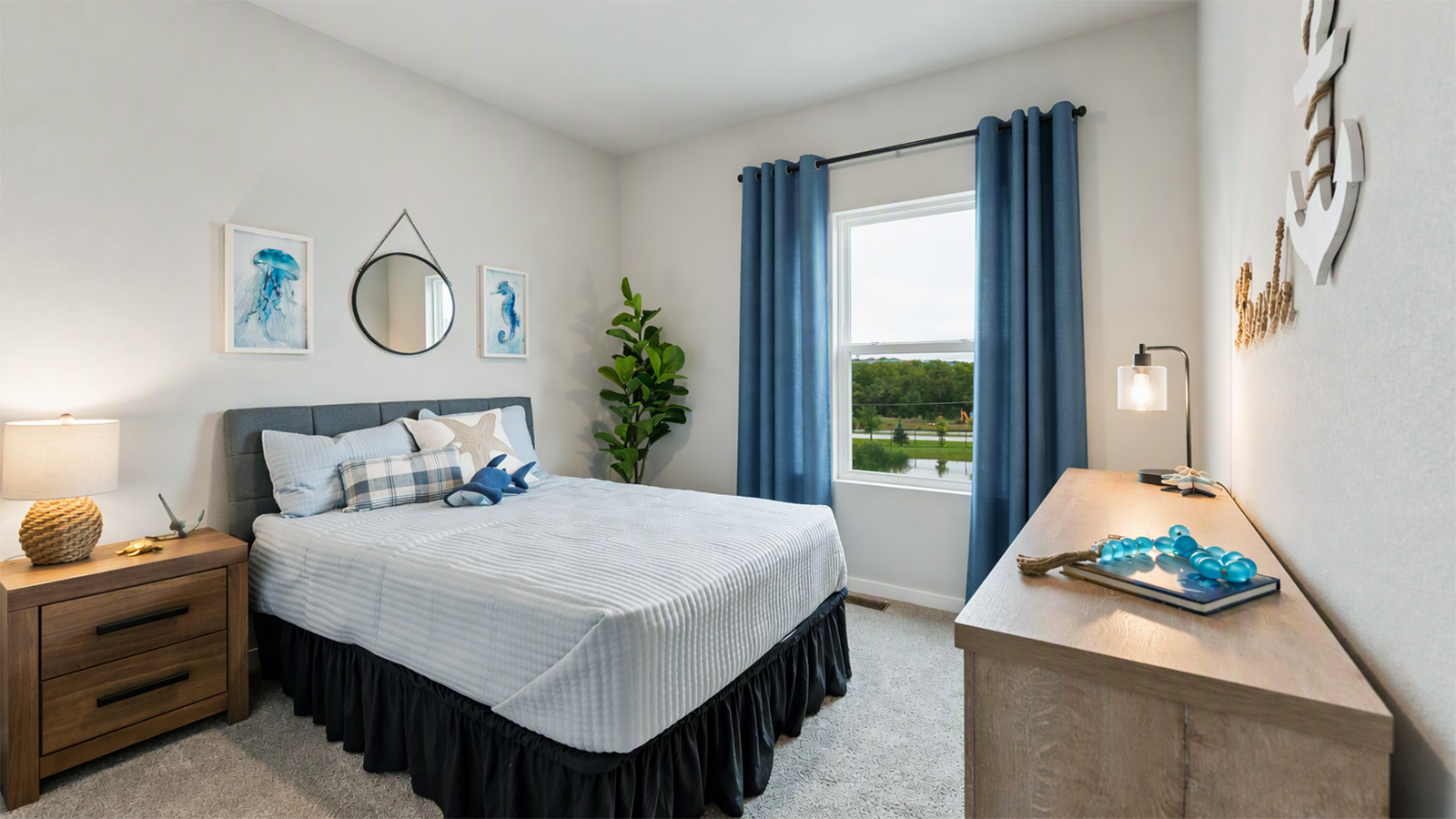 Third bedroom in the Hamilton with queen bed and an ocean theme