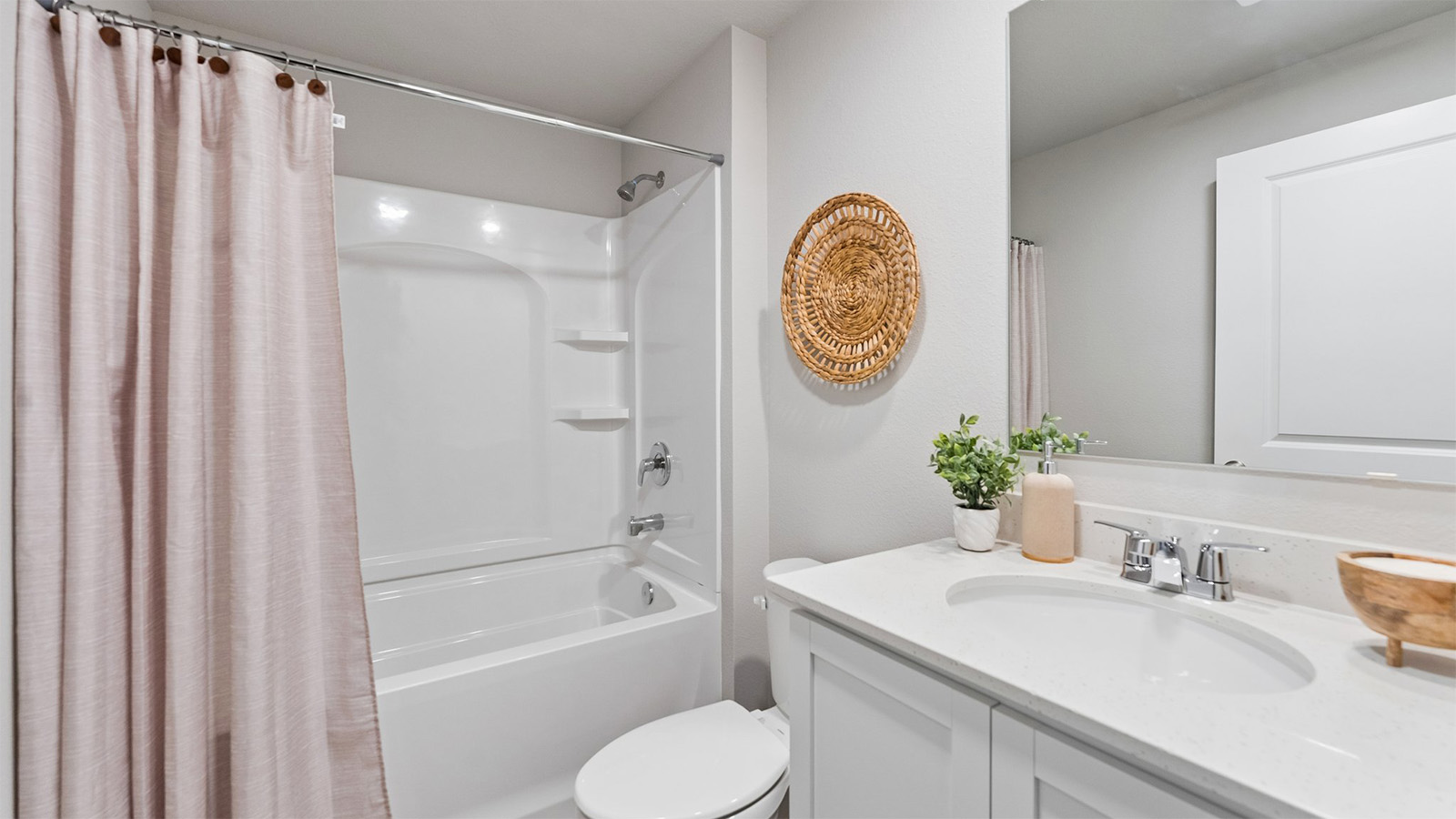 Third bathroom in the finished basement of the Hamilton with a bathtub