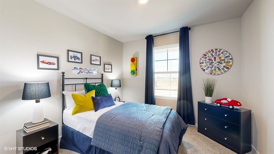 Second bedroom with a full bed and dresser in the Abbott