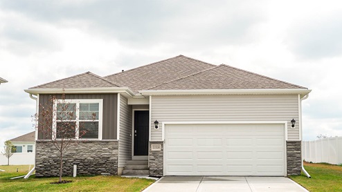 Exterior of Abbott, 2 car garage, covered front porch