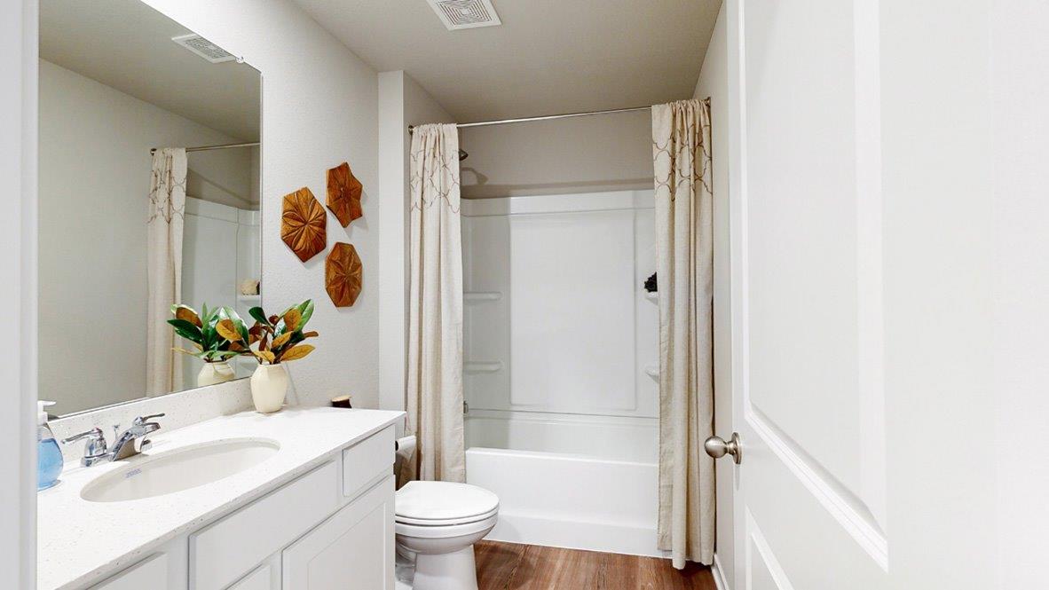 second full bathroom in the hamilton with a bathtub sink and toilet