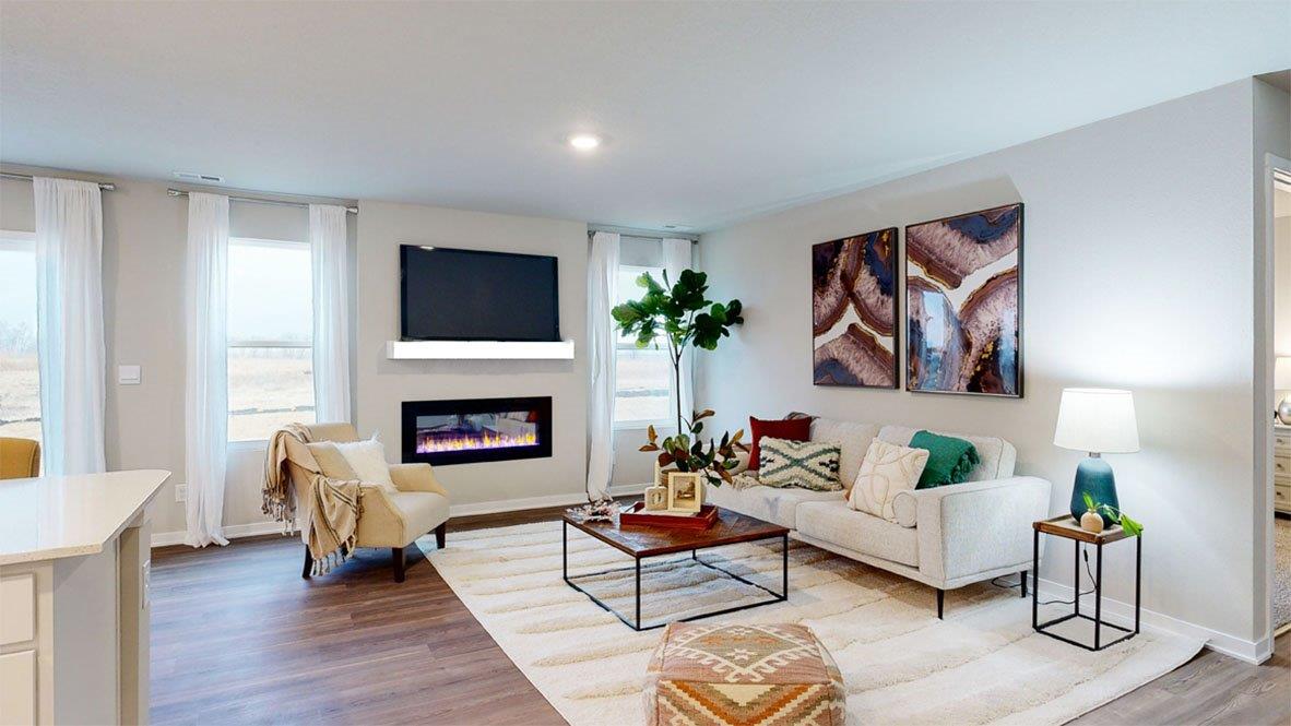 Hamilton living room with a couch and chair around a coffee table