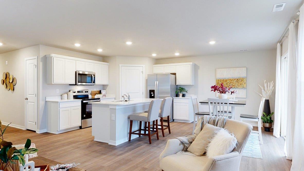 Kitchen and dining room view if standing in the living room of the Hamilton