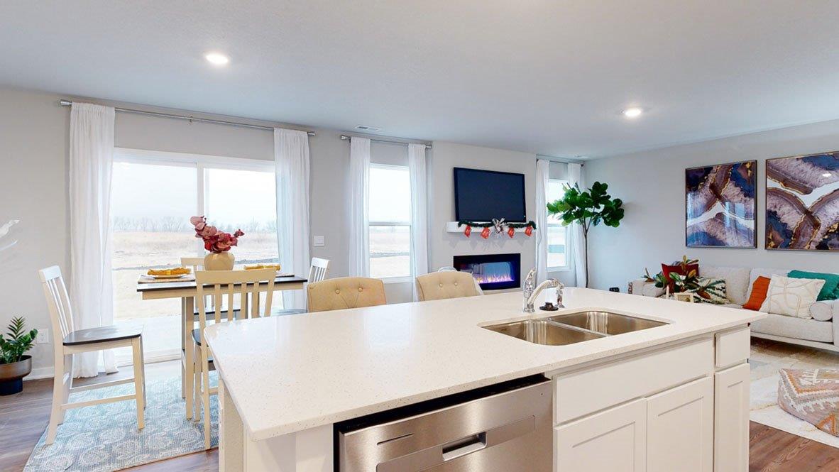 View of living and dining areas from the kitchen in the Hamilton