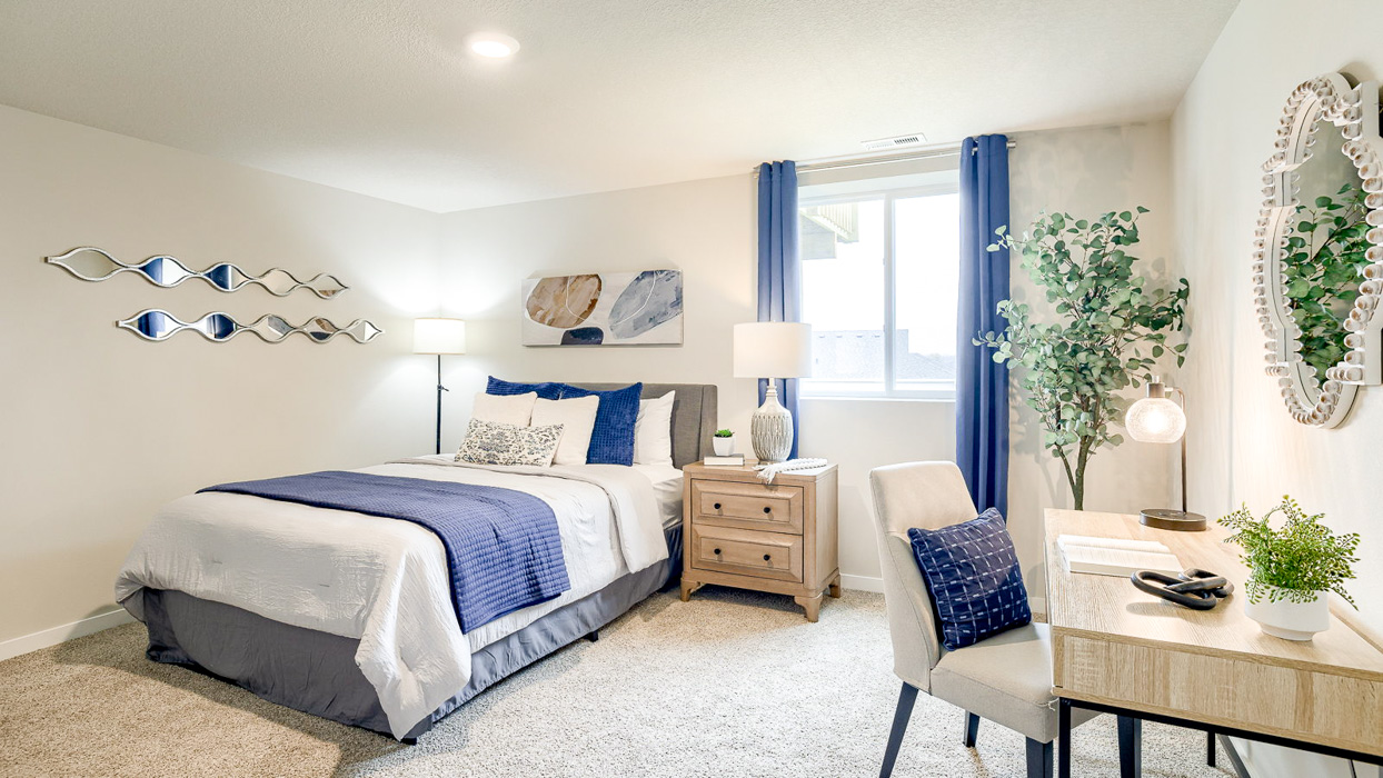 Basement Bedroom with queen bed and desk