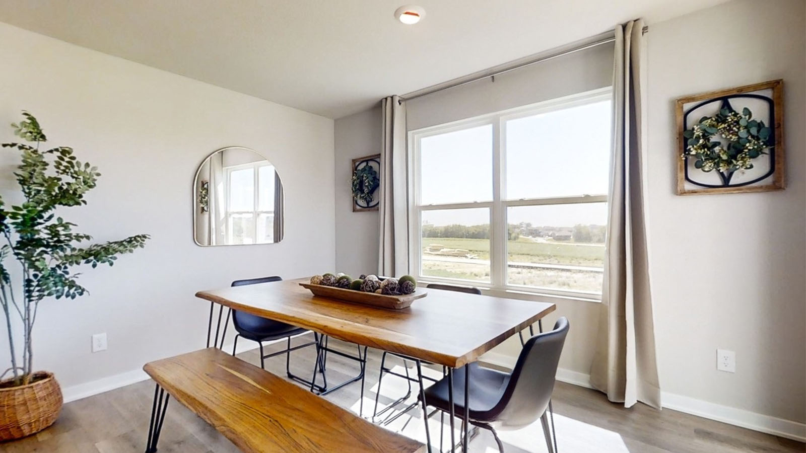 Emerson dining room with natural lighting from large window
