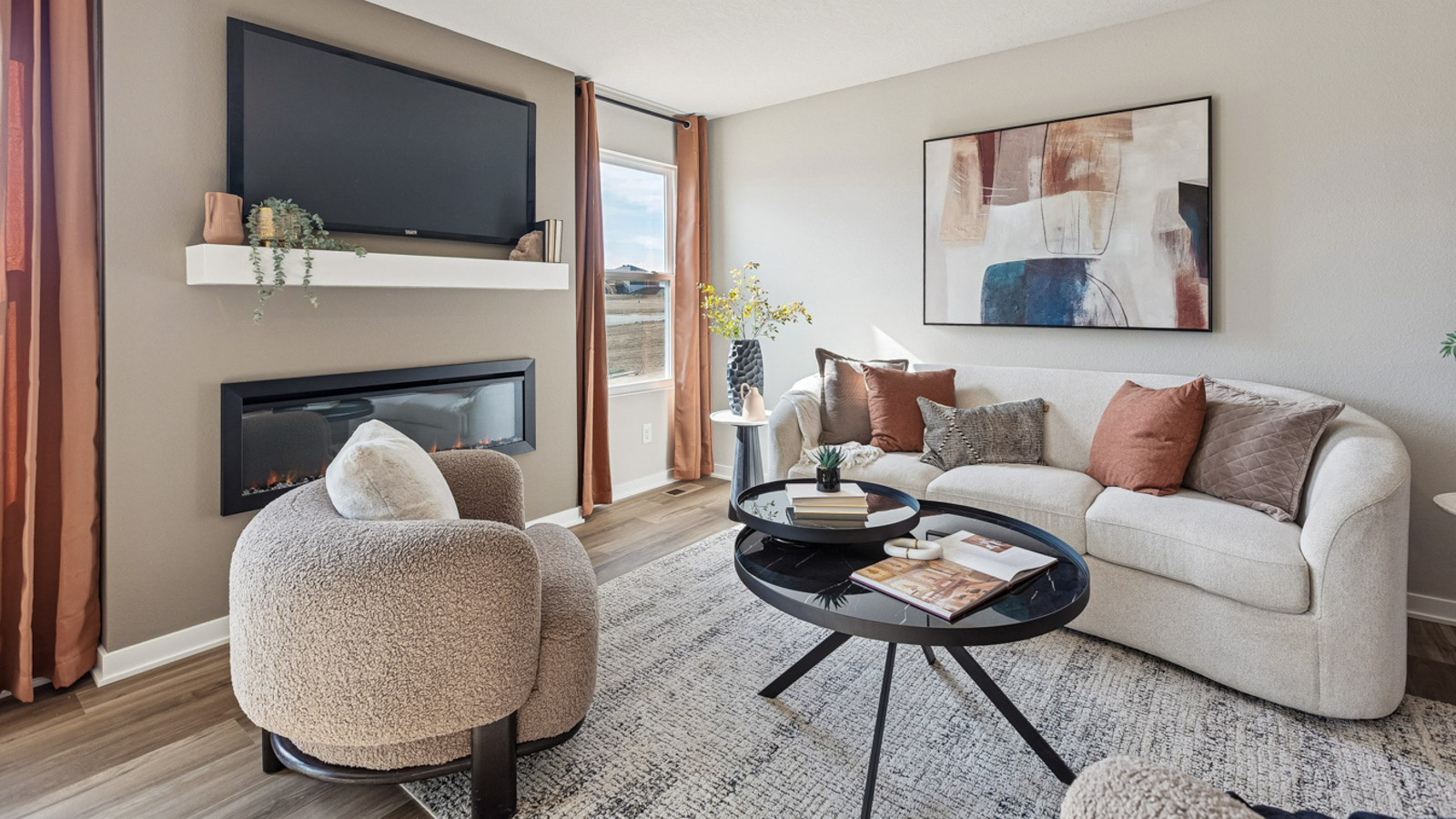 Hamilton living room with couch and chair around a coffee table