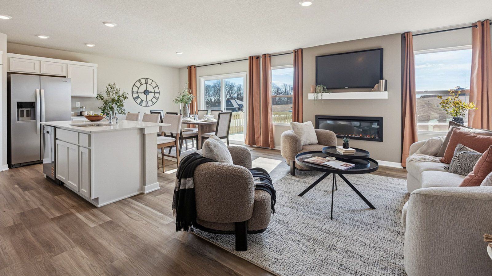 Overview of the Hamilton living room looking into the kitchen and dining area