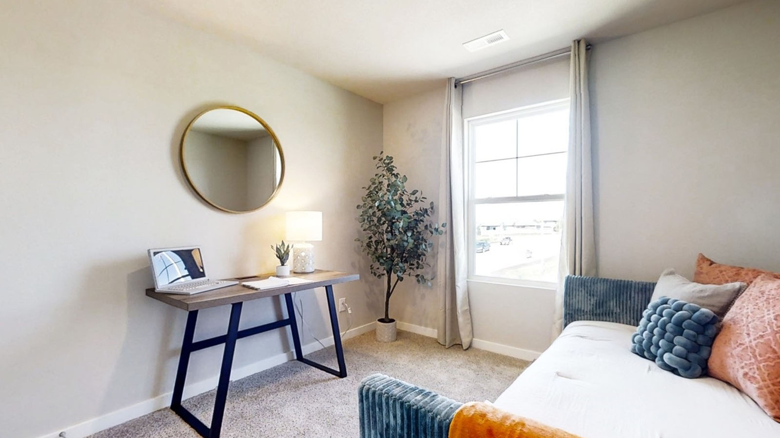 Fourth bedroom in the Edmon with a day bed and desk