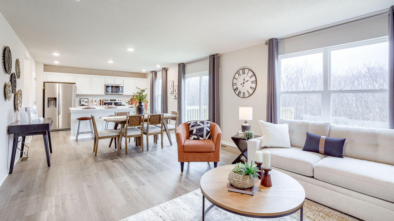Overview of the living room dining area and kitchen in the Bellhaven