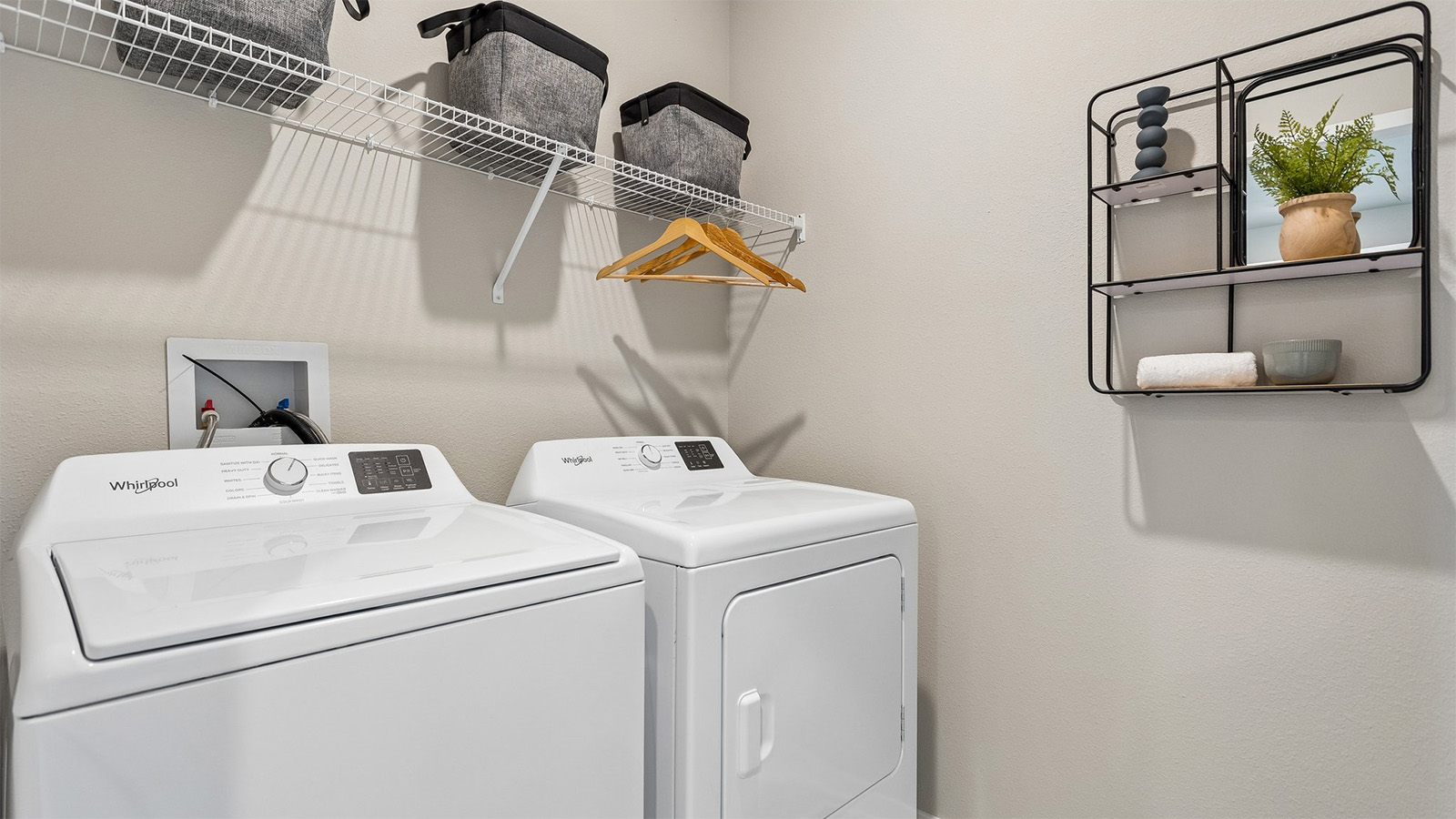 Neuville laundry room with shelf