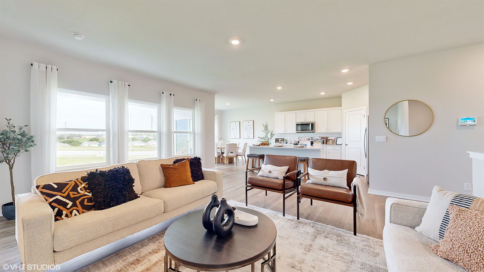 Overview of the Fairfield living room looking into the kitchen and dining room