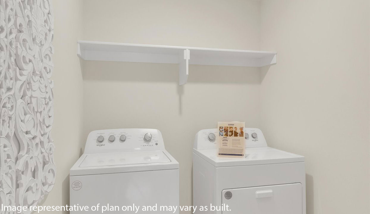 Laundry room with white walls and washer/dryer unit.